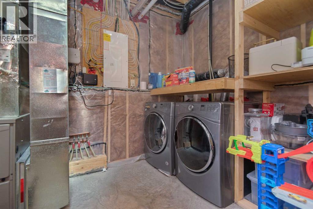 34 Cambridge Close, Blackfalds, AB - Indoor Photo Showing Laundry Room
