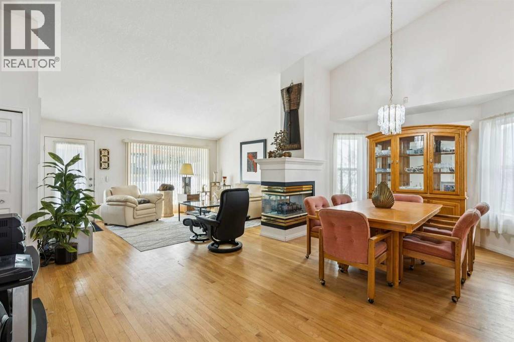 312 Prominence Heights Sw, Calgary, AB - Indoor With Fireplace