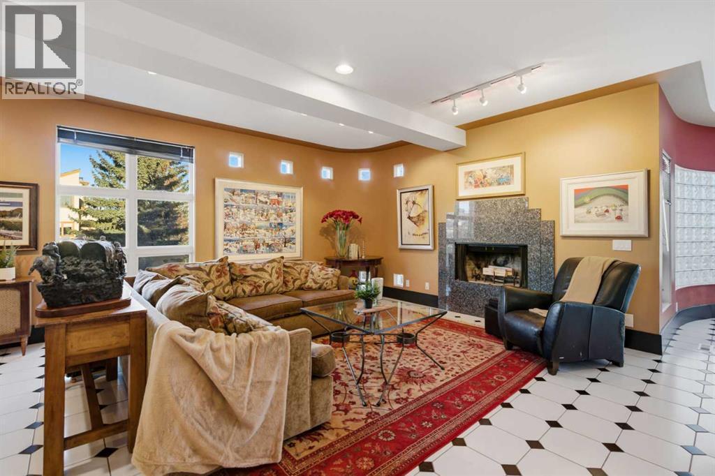 64 Patterson Mews Sw, Calgary, AB - Indoor Photo Showing Living Room With Fireplace