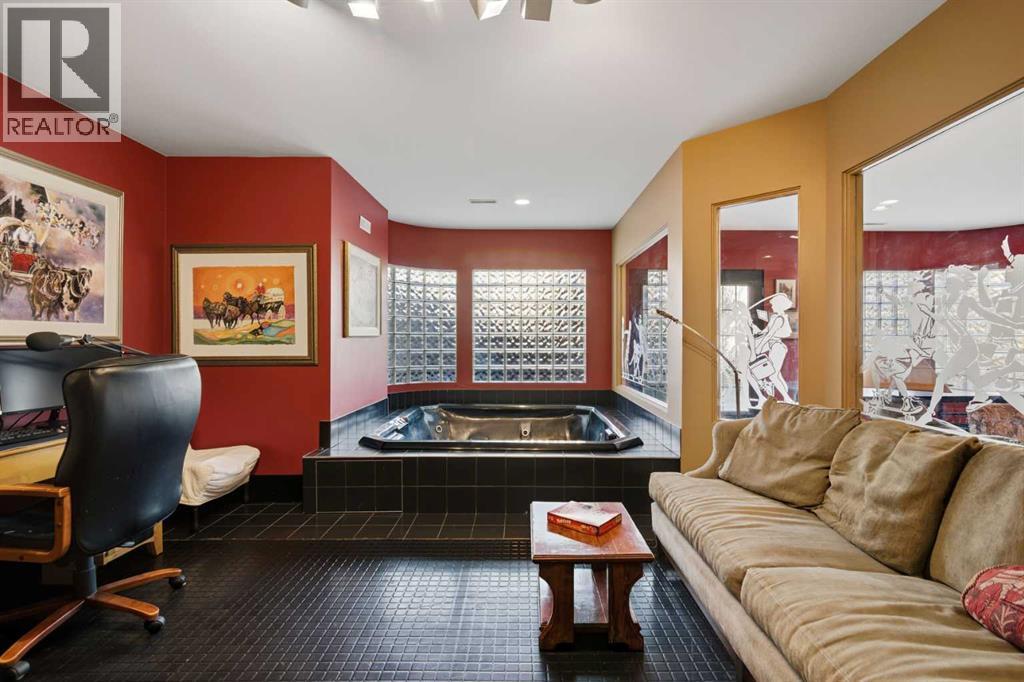 64 Patterson Mews Sw, Calgary, AB - Indoor Photo Showing Living Room