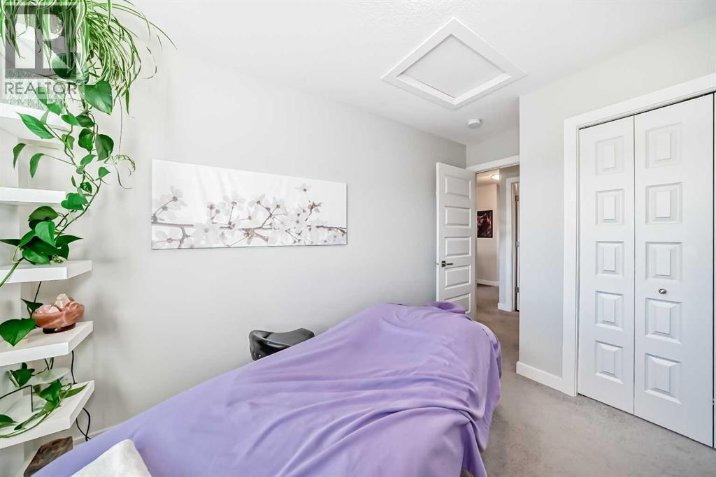 115 Wolf Hollow Park Se, Calgary, AB - Indoor Photo Showing Bedroom