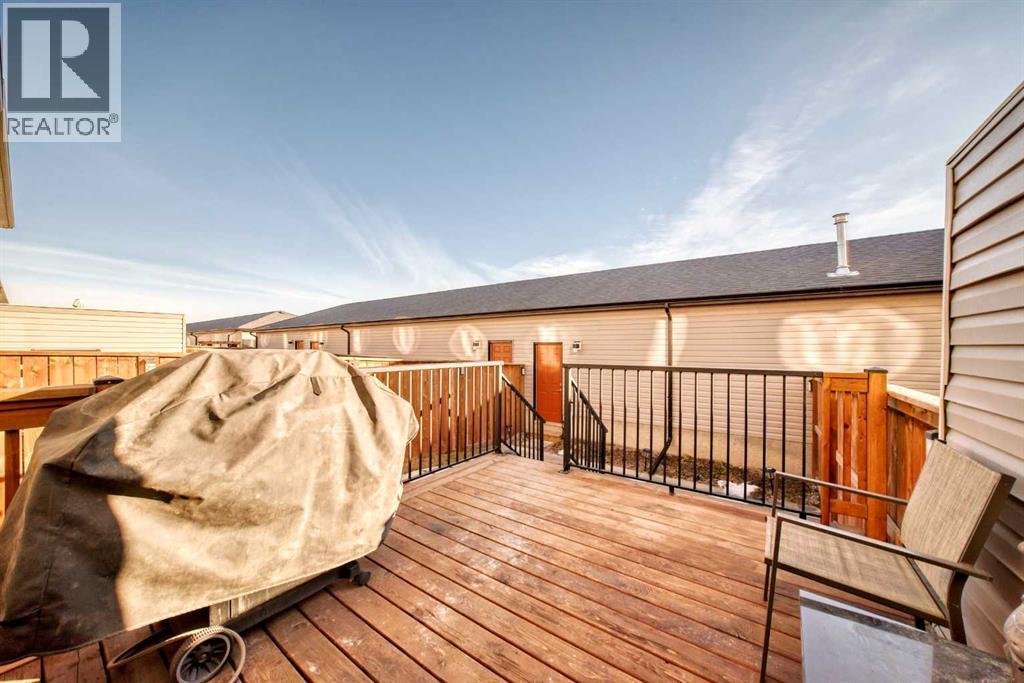 115 Wolf Hollow Park Se, Calgary, AB - Outdoor With Deck Patio Veranda With Exterior