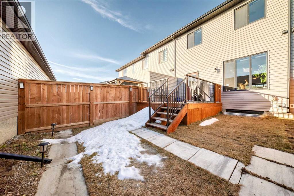 115 Wolf Hollow Park Se, Calgary, AB - Outdoor With Deck Patio Veranda With Exterior