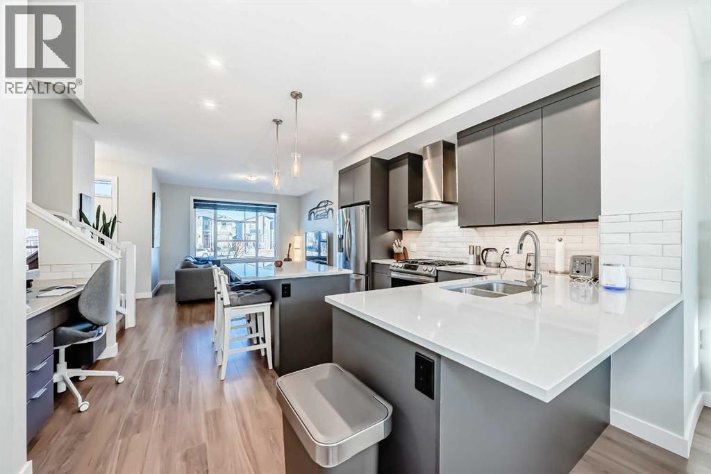 115 Wolf Hollow Park Se, Calgary, AB - Indoor Photo Showing Kitchen With Double Sink With Upgraded Kitchen