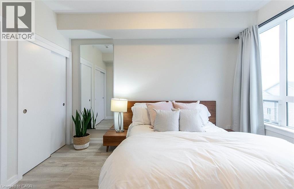 10 Esplanade Lane Unit# 310, Grimsby, ON - Indoor Photo Showing Bedroom