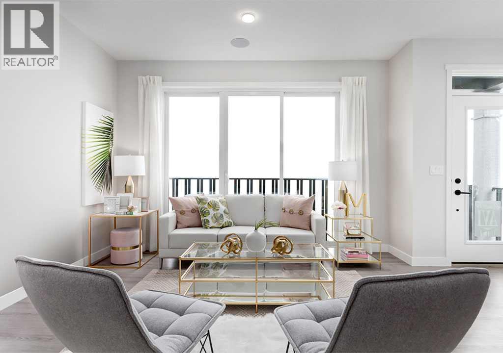 PLEASE NOTE: Photos are of a Showhome of the same model – fit & finish may differ. Interior selections & floorplans shown in photos - 162 Lanark Gate Se, Airdrie, AB - Indoor Photo Showing Living Room