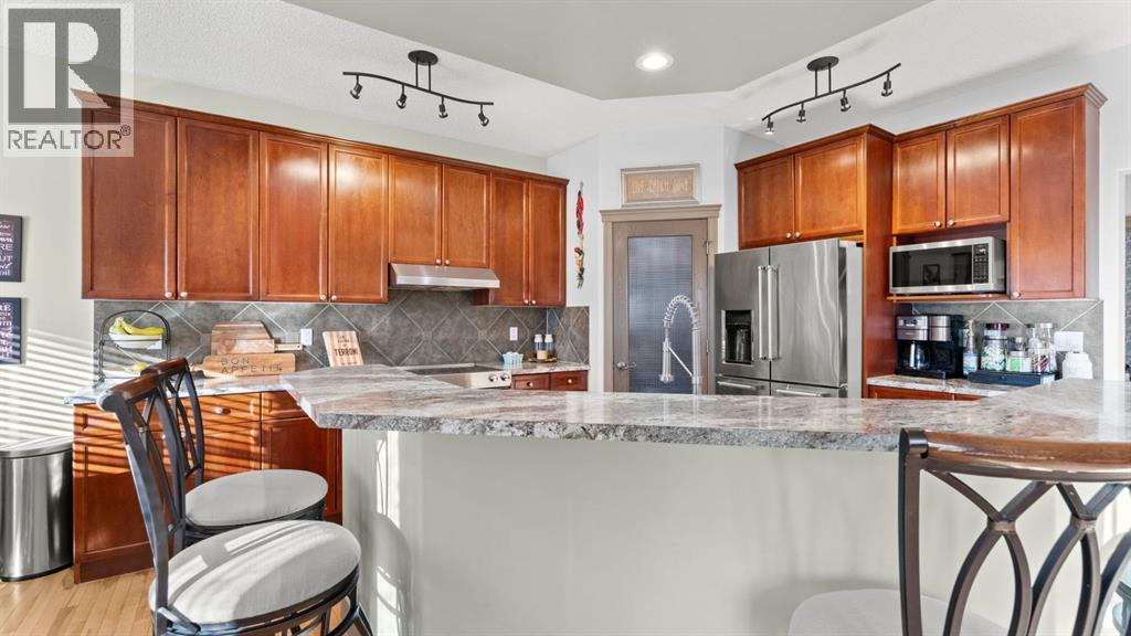 189 Rockyspring Terrace Nw, Calgary, AB - Indoor Photo Showing Kitchen With Stainless Steel Kitchen With Upgraded Kitchen