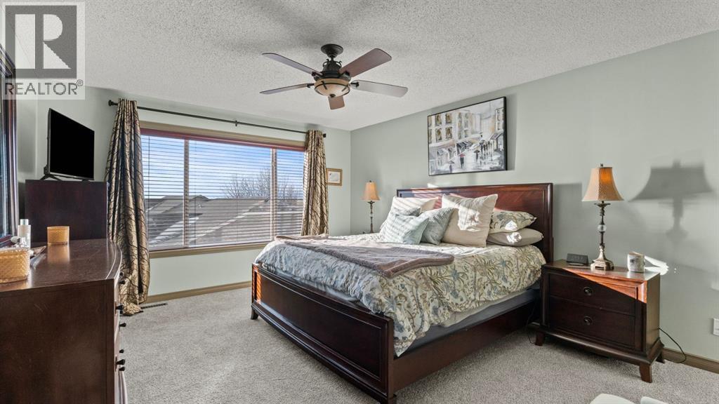 189 Rockyspring Terrace Nw, Calgary, AB - Indoor Photo Showing Bedroom