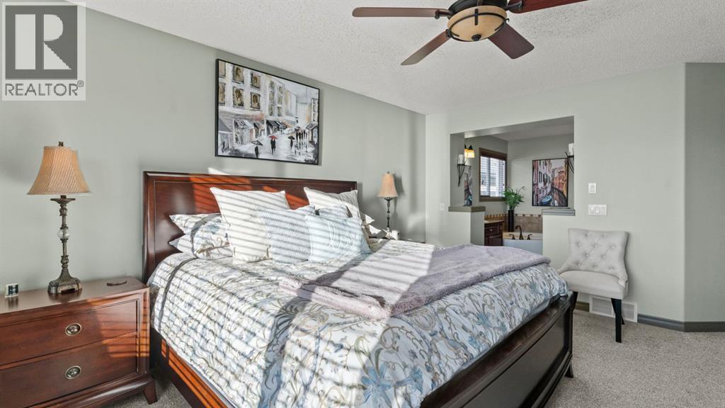 189 Rockyspring Terrace Nw, Calgary, AB - Indoor Photo Showing Bedroom