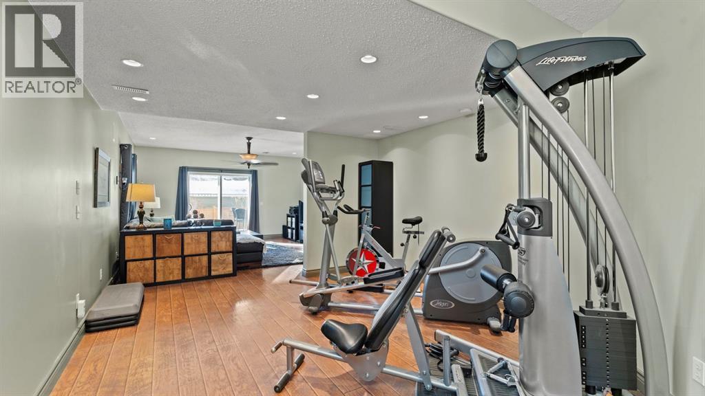189 Rockyspring Terrace Nw, Calgary, AB - Indoor Photo Showing Gym Room