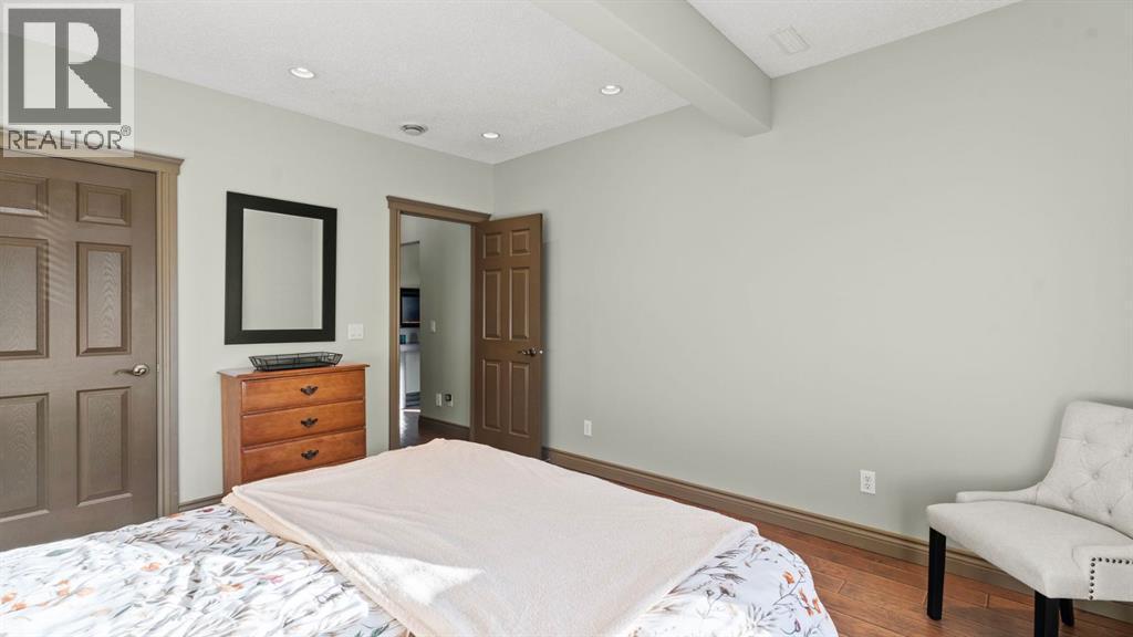 189 Rockyspring Terrace Nw, Calgary, AB - Indoor Photo Showing Bedroom