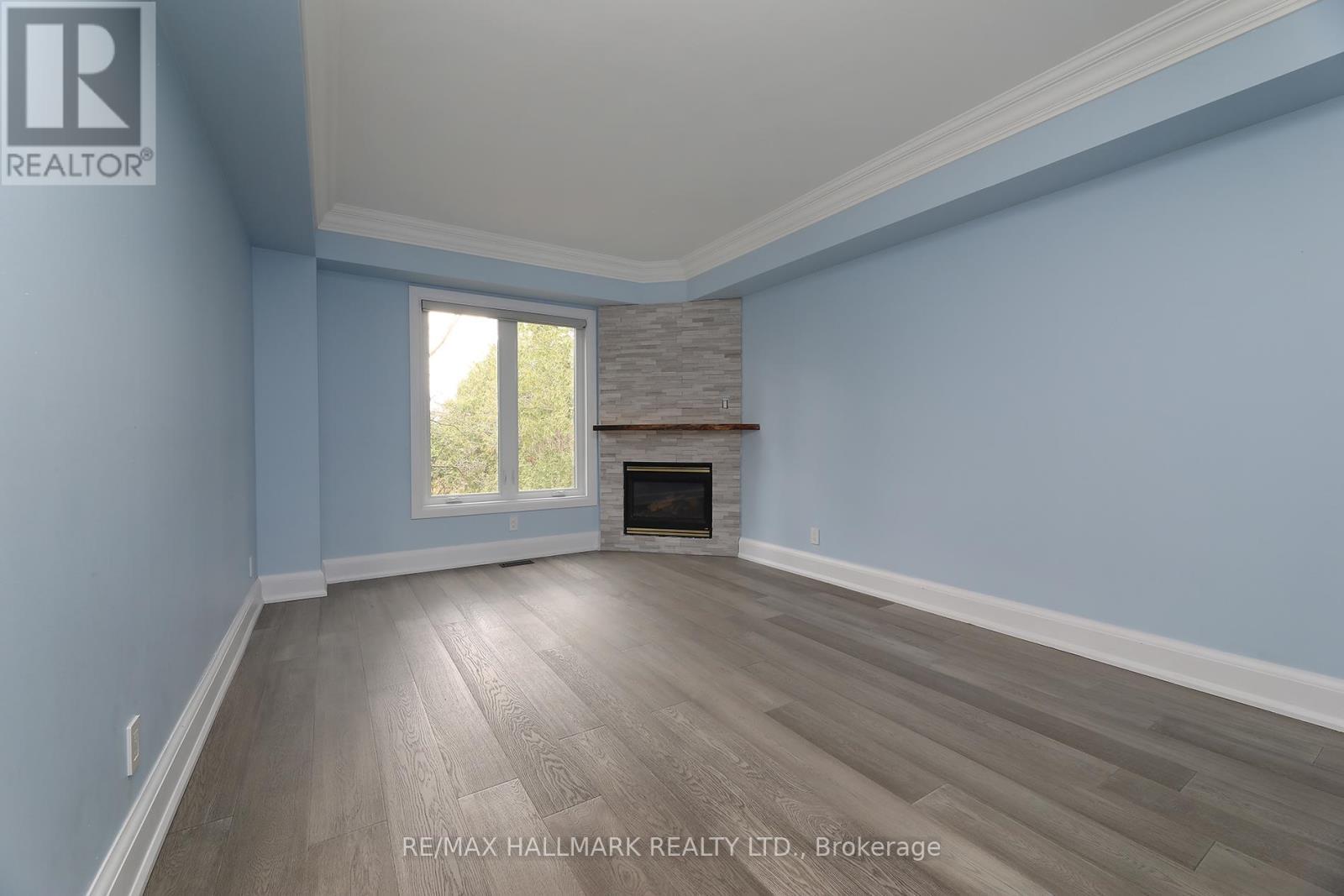 88 Colonel Danforth Trail, Toronto, ON - Indoor Photo Showing Living Room With Fireplace