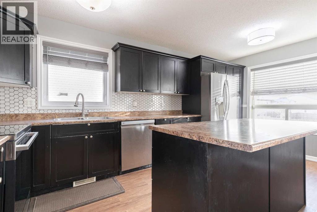 263 Upland Avenue, Brooks, AB - Indoor Photo Showing Kitchen With Double Sink With Upgraded Kitchen