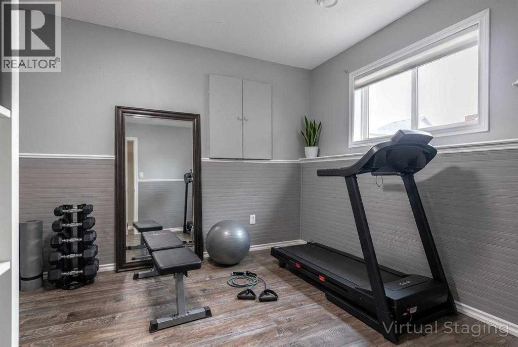 263 Upland Avenue, Brooks, AB - Indoor Photo Showing Gym Room