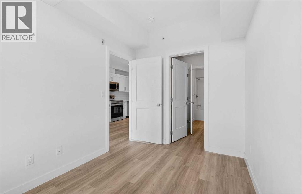 411, 40 Sage Hill Walk Nw, Calgary, AB - Indoor Photo Showing Other Room