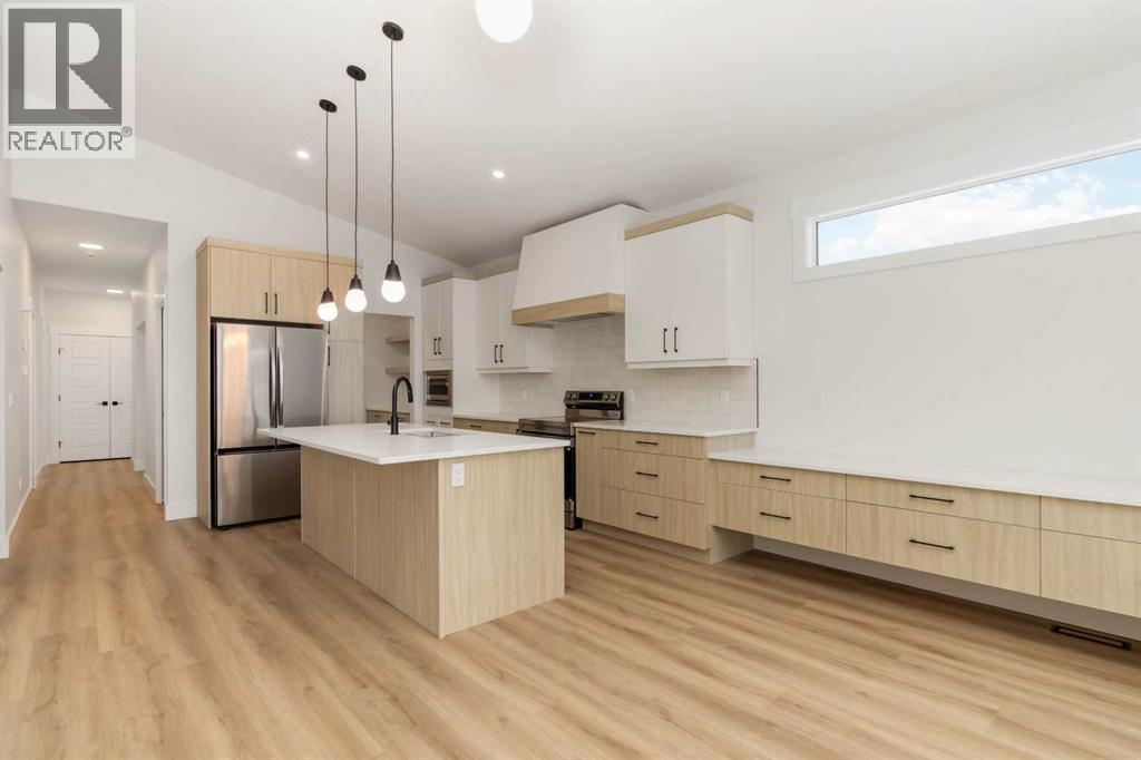 120 Beaconview Place, Fort Mcmurray, AB - Indoor Photo Showing Kitchen With Upgraded Kitchen