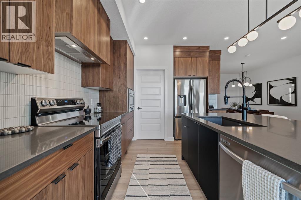 61 Keystone Creek Terrace, Calgary, AB - Indoor Photo Showing Kitchen With Stainless Steel Kitchen With Upgraded Kitchen