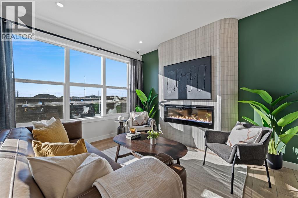 61 Keystone Creek Terrace, Calgary, AB - Indoor Photo Showing Living Room With Fireplace