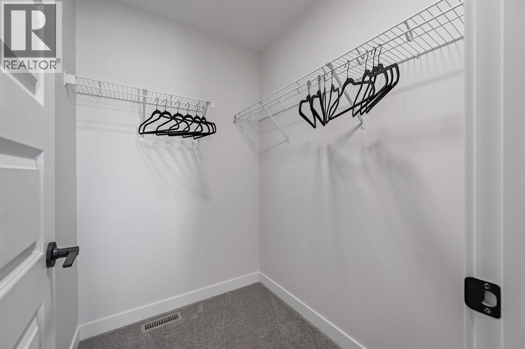 61 Keystone Creek Terrace, Calgary, AB - Indoor Photo Showing Other Room