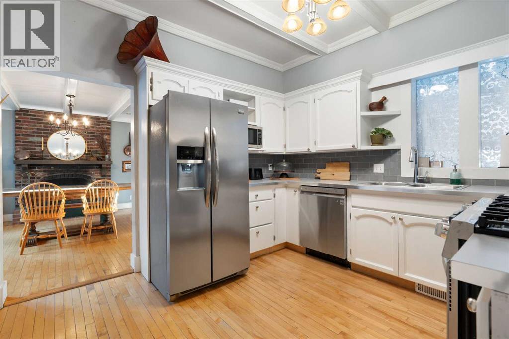 10507 Bradbury Drive Sw, Calgary, AB - Indoor Photo Showing Kitchen With Stainless Steel Kitchen