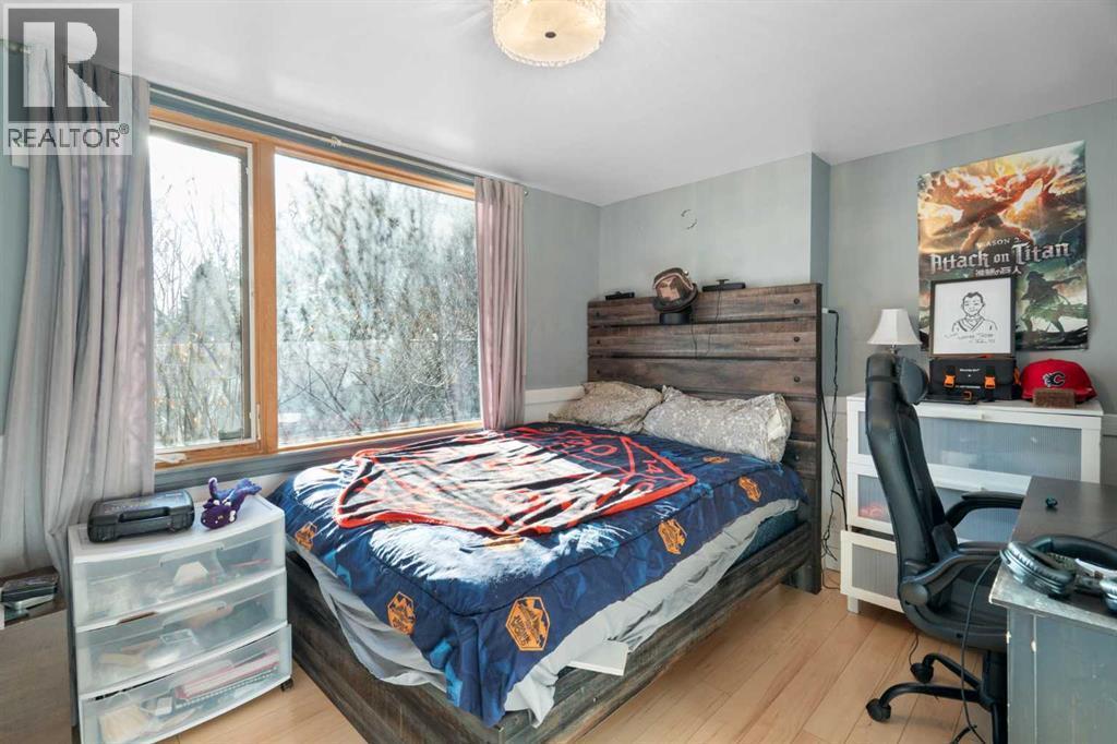 Bedroom 2 - 10507 Bradbury Drive Sw, Calgary, AB - Indoor Photo Showing Bedroom