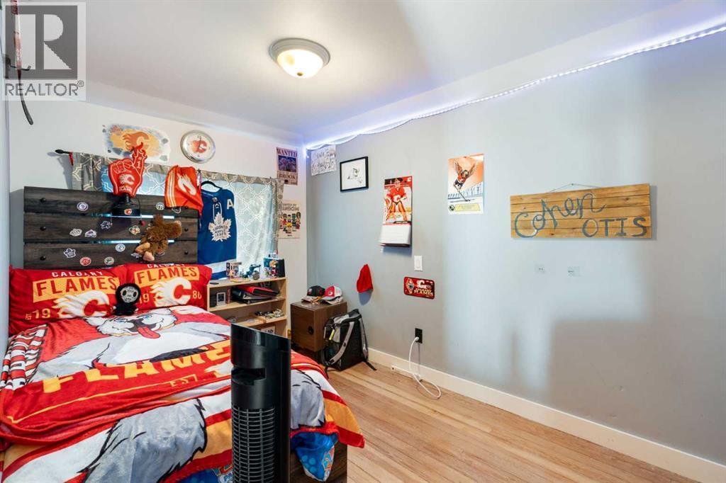 Bedroom 3 - 10507 Bradbury Drive Sw, Calgary, AB - Indoor Photo Showing Other Room