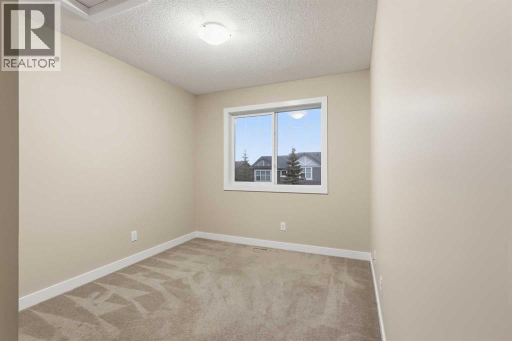 71 Panatella Hill Nw, Calgary, AB - Indoor Photo Showing Other Room