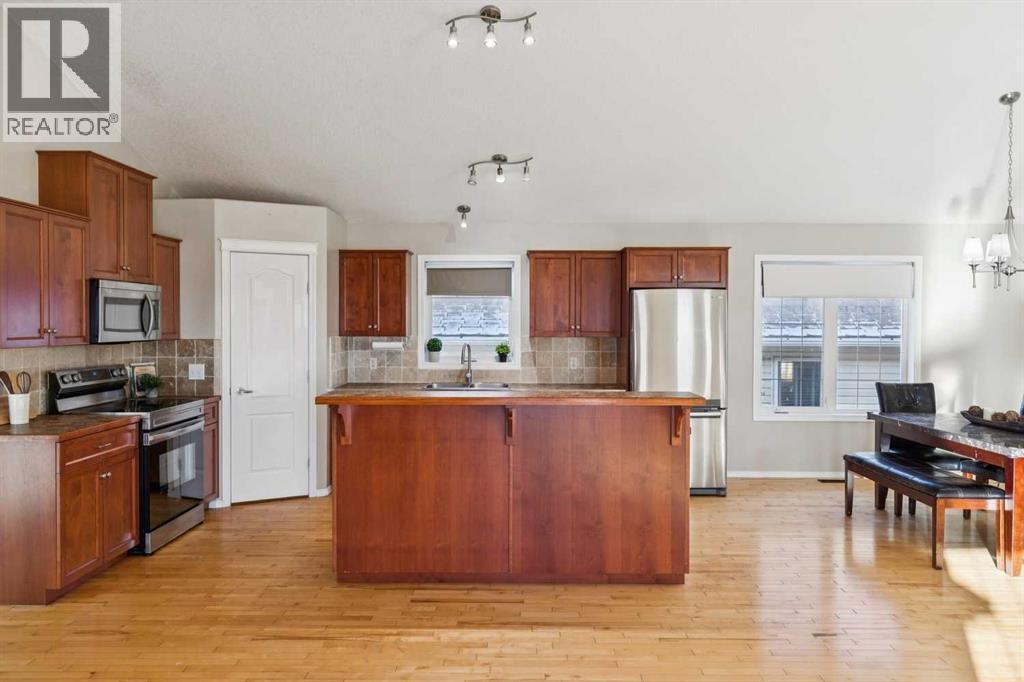 100B Westview Drive, Nanton, AB - Indoor Photo Showing Kitchen With Stainless Steel Kitchen