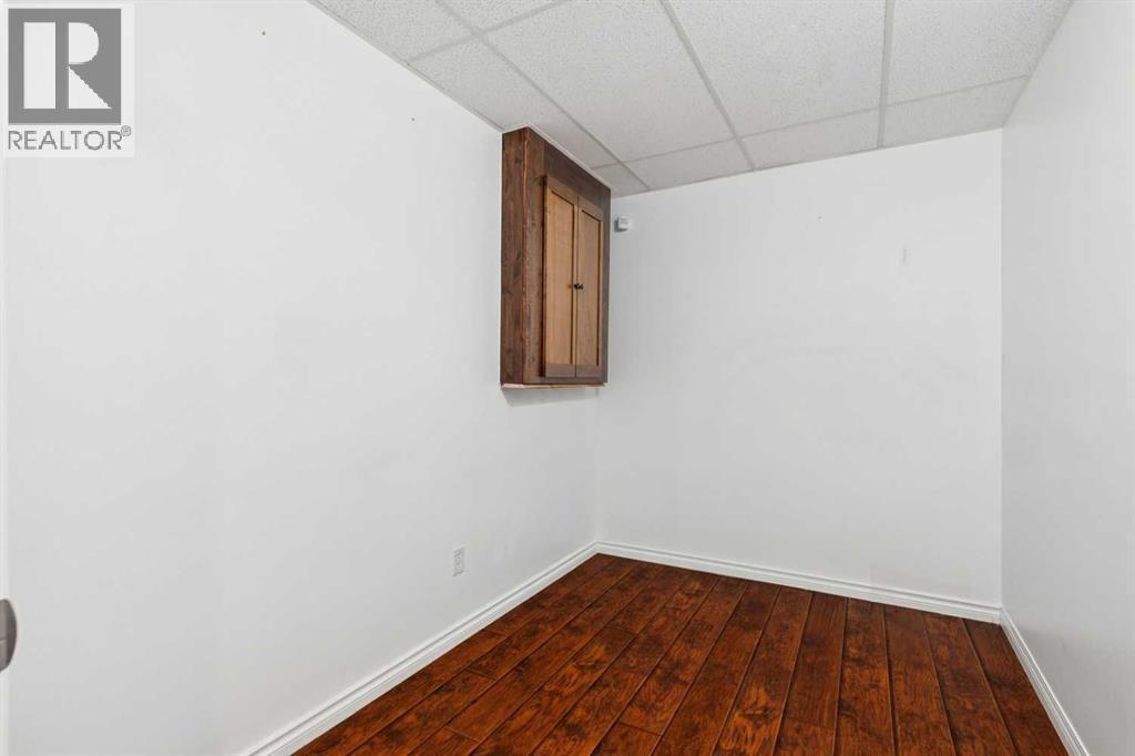 Den - 100B Westview Drive, Nanton, AB - Indoor Photo Showing Other Room