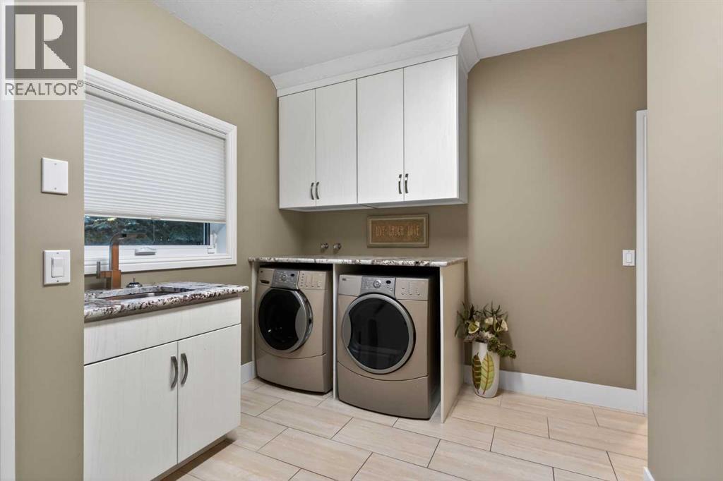 14 Christie Estate Terrace Sw, Calgary, AB - Indoor Photo Showing Laundry Room
