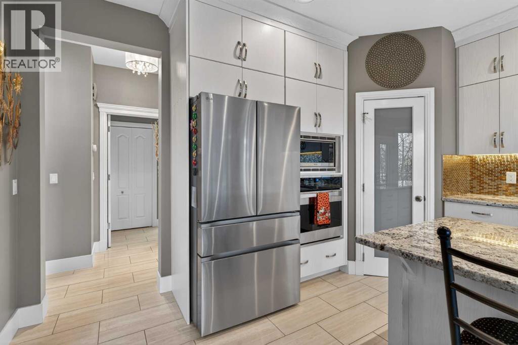14 Christie Estate Terrace Sw, Calgary, AB - Indoor Photo Showing Kitchen With Upgraded Kitchen