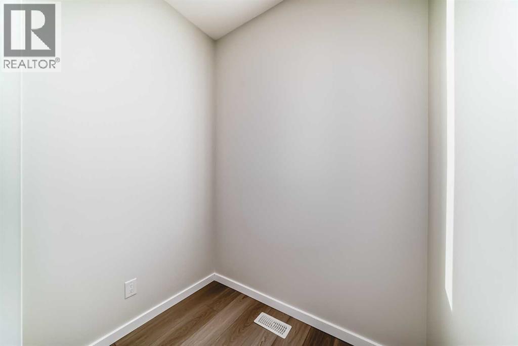 PLEASE NOTE: Photos are of a DIFFERENT Spec Home of the same model – fit and finish may differ. Interior selections and floorplans shown in photos - 158 Bartlett Crescent Se, Calgary, AB - Indoor Photo Showing Other Room