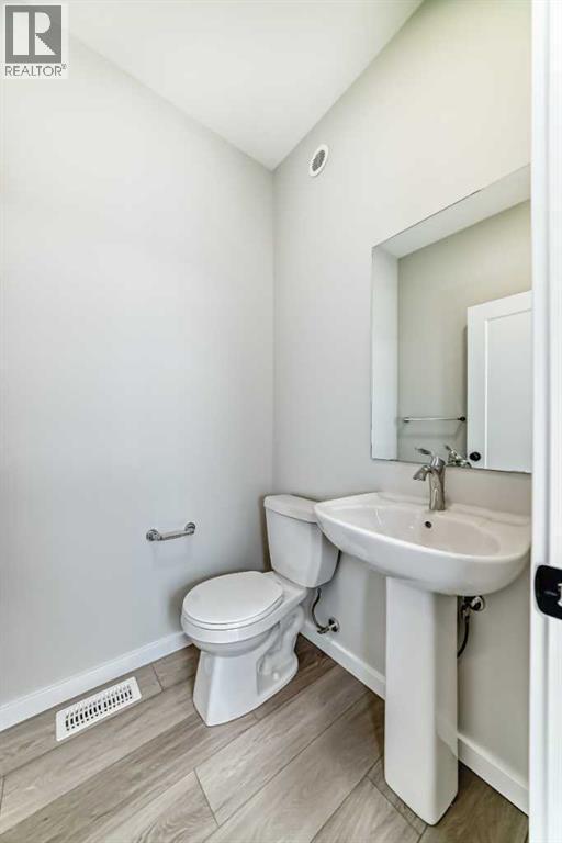 PLEASE NOTE: Photos are of a DIFFERENT Spec Home of the same model – fit and finish may differ. Interior selections and floorplans shown in photos - 158 Bartlett Crescent Se, Calgary, AB - Indoor Photo Showing Bathroom