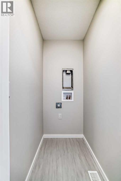 PLEASE NOTE: Photos are of a DIFFERENT Spec Home of the same model – fit and finish may differ. Interior selections and floorplans shown in photos - 158 Bartlett Crescent Se, Calgary, AB - Indoor Photo Showing Other Room