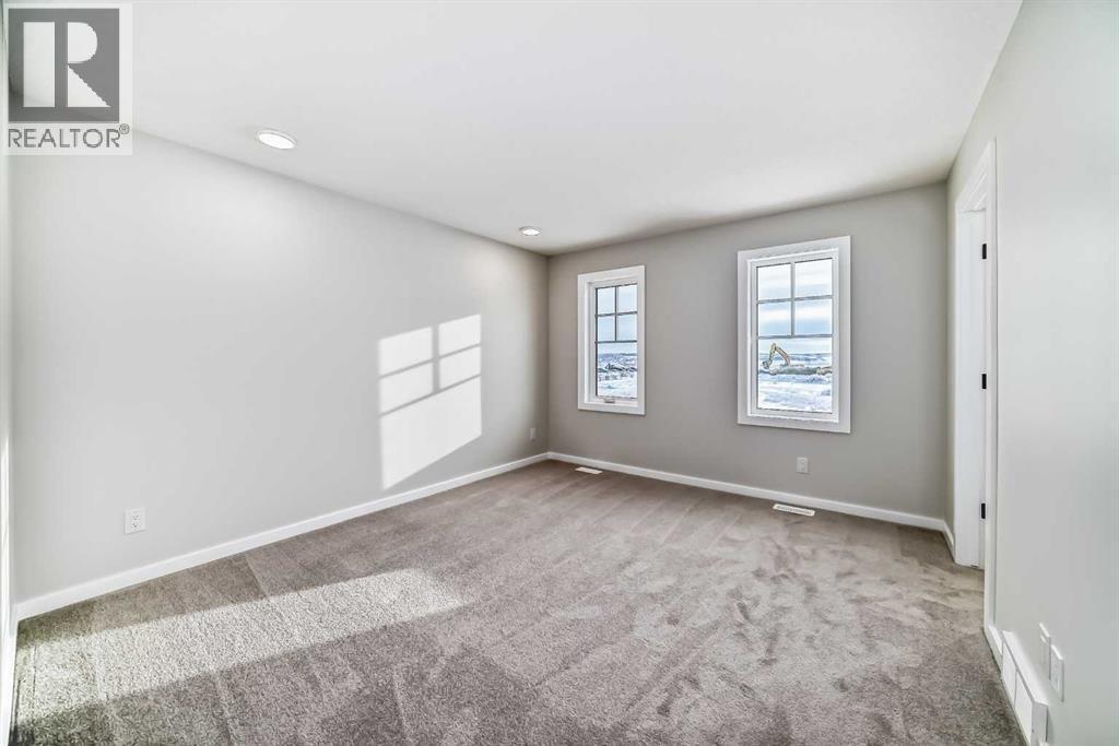 PLEASE NOTE: Photos are of a DIFFERENT Spec Home of the same model – fit and finish may differ. Interior selections and floorplans shown in photos - 158 Bartlett Crescent Se, Calgary, AB - Indoor Photo Showing Other Room