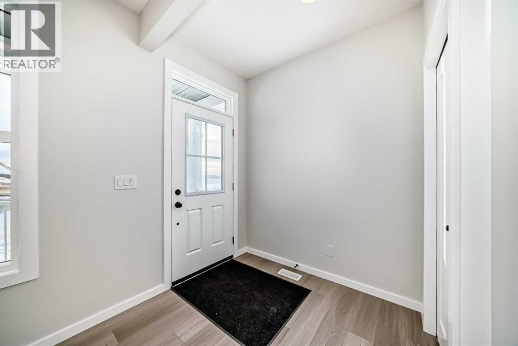 PLEASE NOTE: Photos are of a DIFFERENT Spec Home of the same model – fit and finish may differ. Interior selections and floorplans shown in photos - 158 Bartlett Crescent Se, Calgary, AB - Indoor Photo Showing Other Room