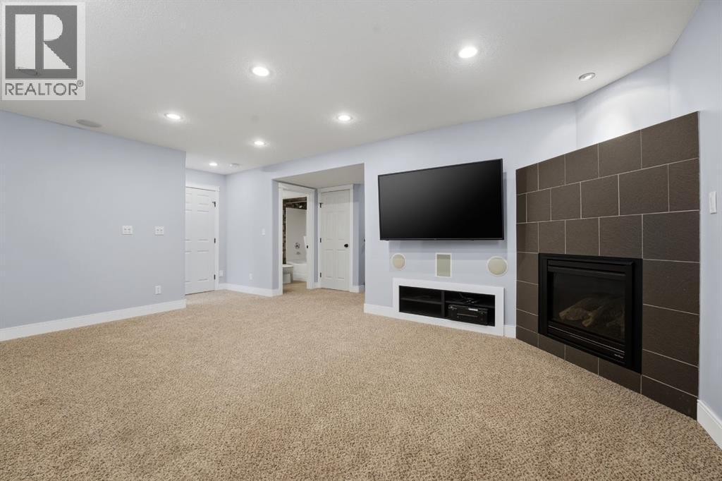 83 Kirton Close, Red Deer, AB - Indoor With Fireplace