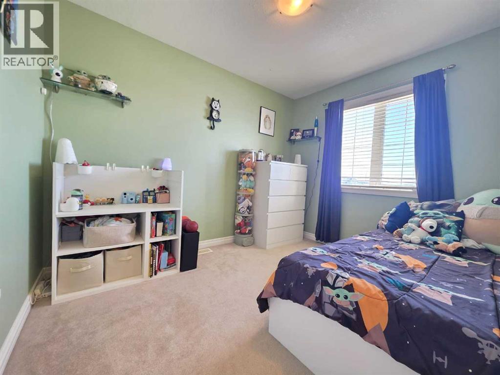 Bedroom #1 - 1, 2602 11 Avenue, Wainwright, AB - Indoor Photo Showing Bedroom