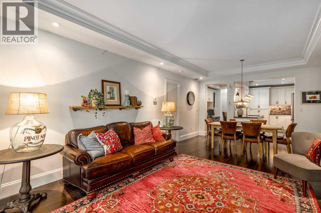 105, 121 Quarry Way Se, Calgary, AB - Indoor Photo Showing Living Room