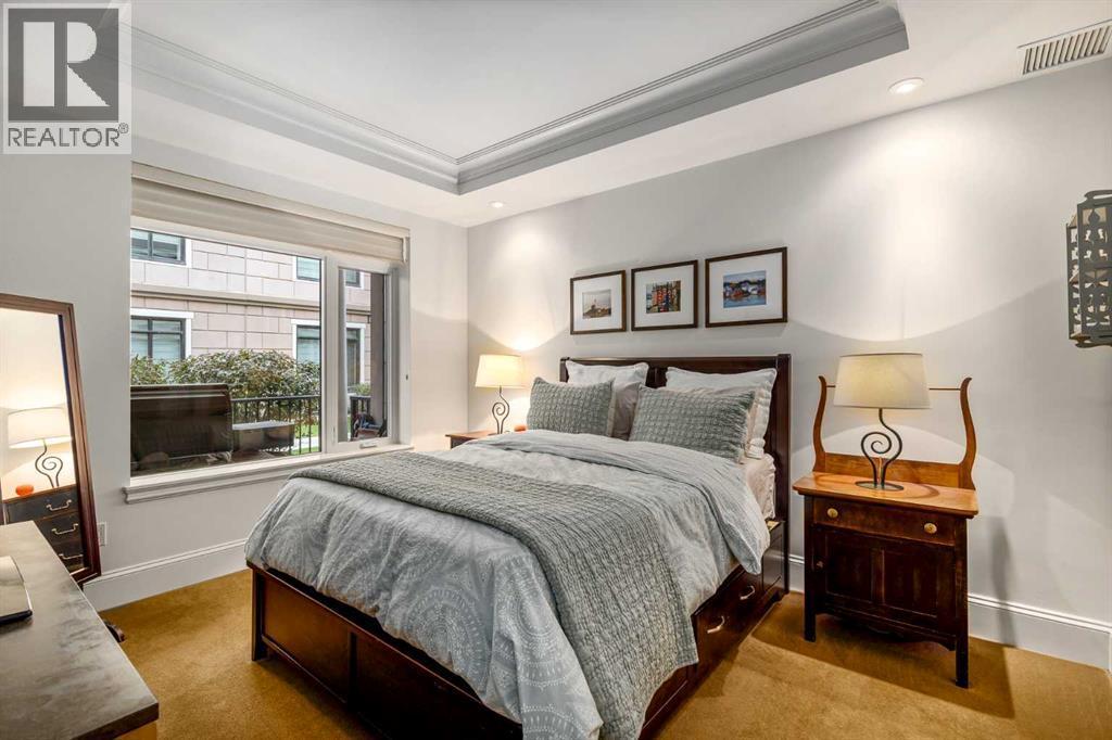 105, 121 Quarry Way Se, Calgary, AB - Indoor Photo Showing Bedroom