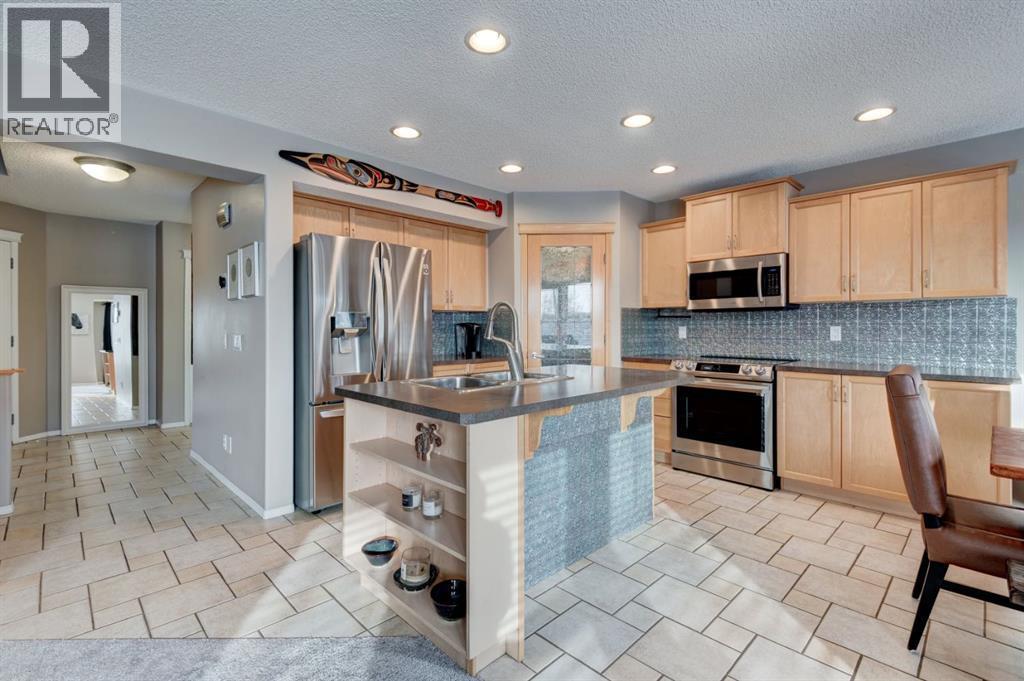 162 Somerside Crescent Sw, Calgary, AB - Indoor Photo Showing Kitchen With Stainless Steel Kitchen With Double Sink