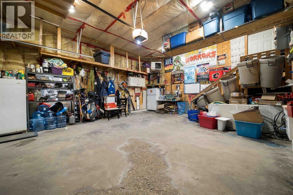 110 Redcliff Way Sw, Redcliff, AB - Indoor Photo Showing Garage