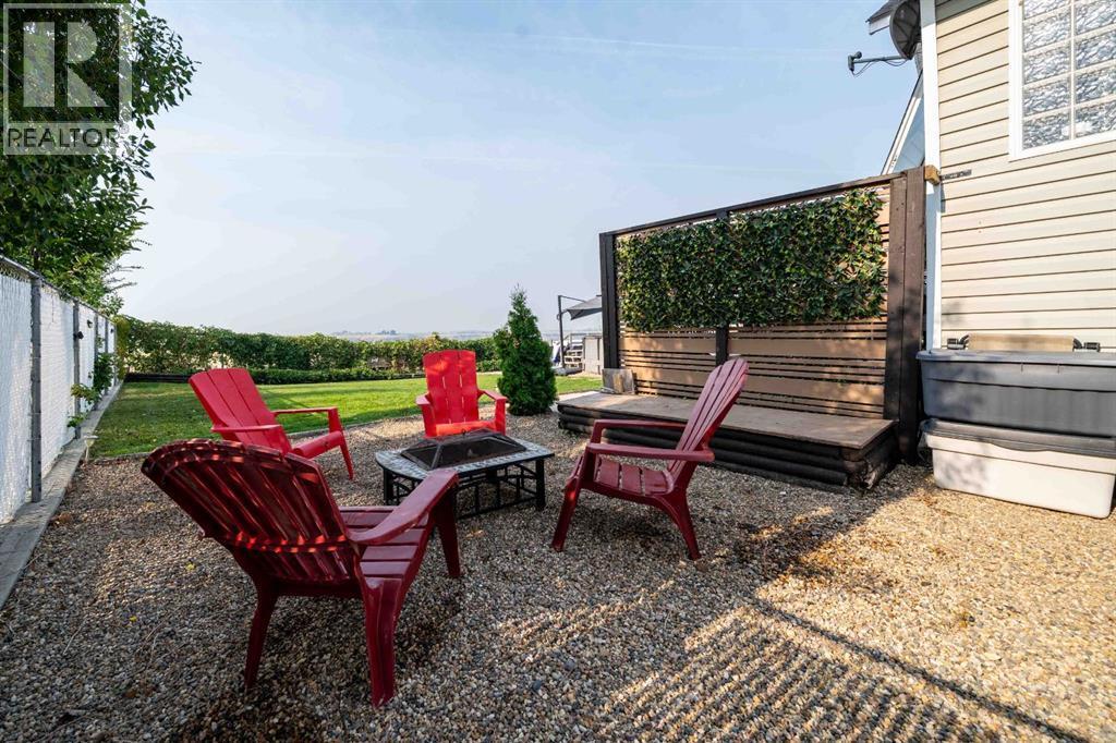 110 Redcliff Way Sw, Redcliff, AB - Outdoor With Deck Patio Veranda