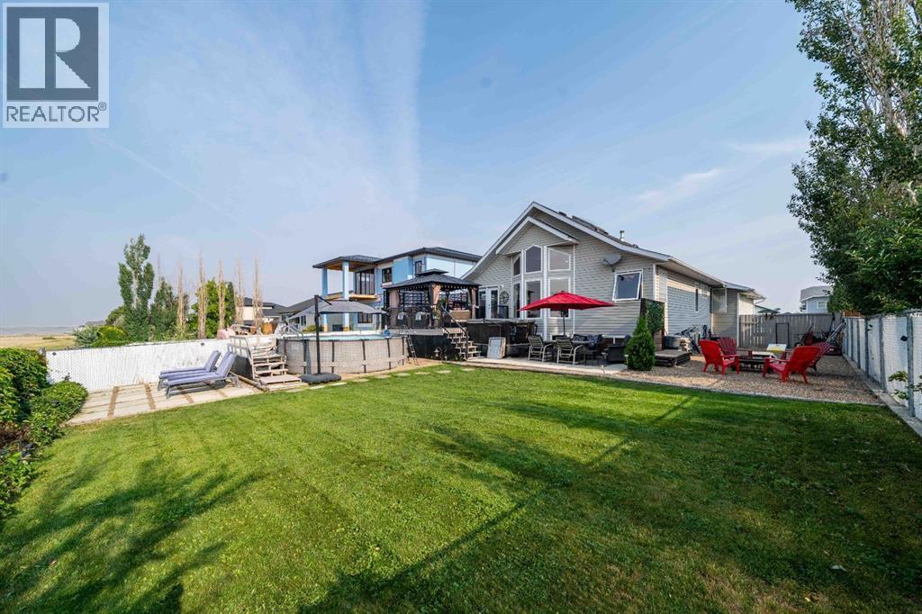 110 Redcliff Way Sw, Redcliff, AB - Outdoor With Deck Patio Veranda