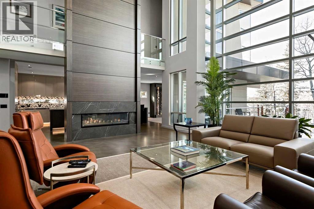 25 Posthill Drive Sw, Calgary, AB - Indoor Photo Showing Living Room