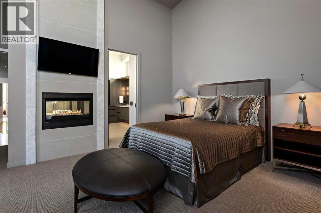 25 Posthill Drive Sw, Calgary, AB - Indoor Photo Showing Bedroom