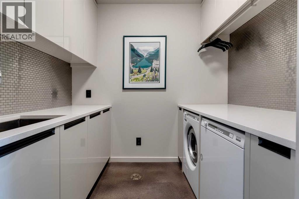 25 Posthill Drive Sw, Calgary, AB - Indoor Photo Showing Laundry Room