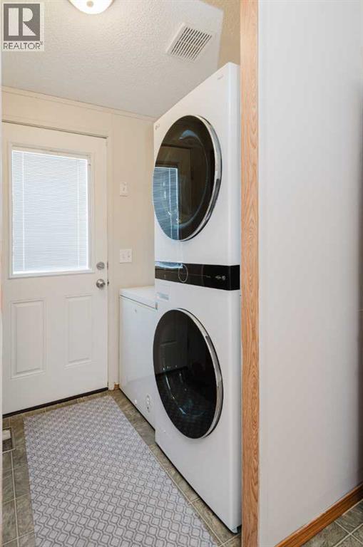 9614 103 Avenue, Clairmont, AB - Indoor Photo Showing Laundry Room
