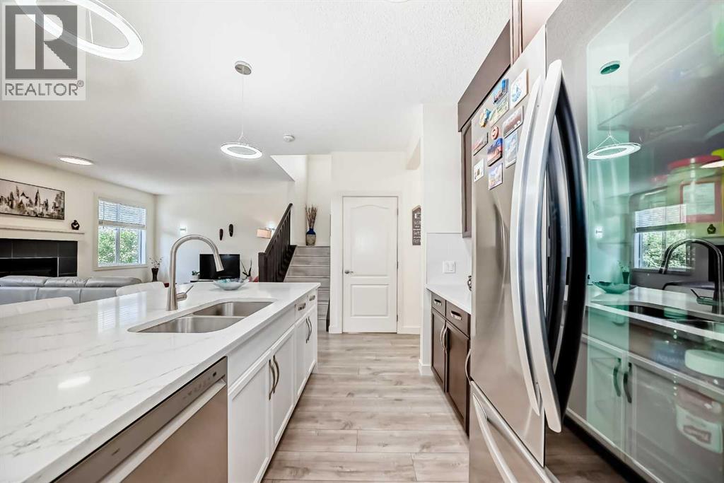 437 Auburn Bay Drive Se, Calgary, AB - Indoor Photo Showing Kitchen With Double Sink With Upgraded Kitchen