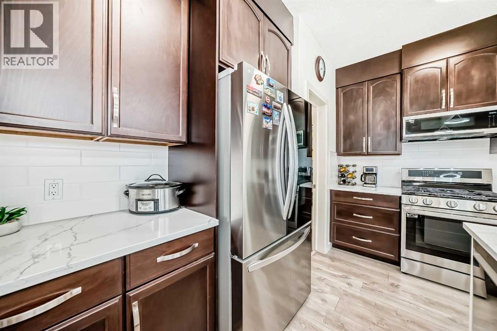 437 Auburn Bay Drive Se, Calgary, AB - Indoor Photo Showing Kitchen